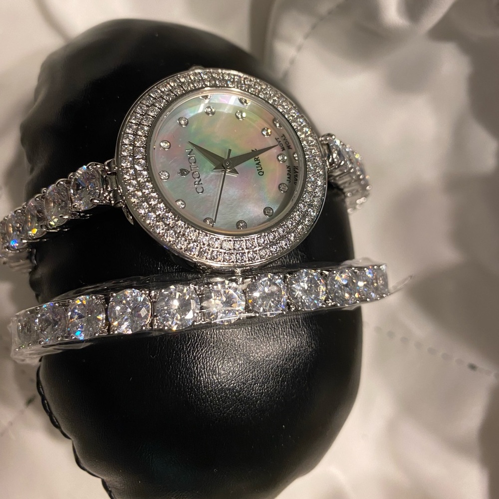 2 pc Croton Women Silver CZ Watch/tennis Bracelet Set with Mother of Pearl Dial.